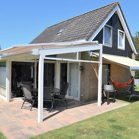 Holiday Home Mosselbank: Seaside Retreat with Private Garden Ouddorp Exterior photo